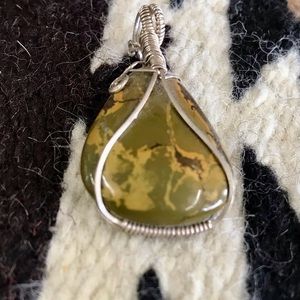 Custom-made wire wrap sterling silver pendant